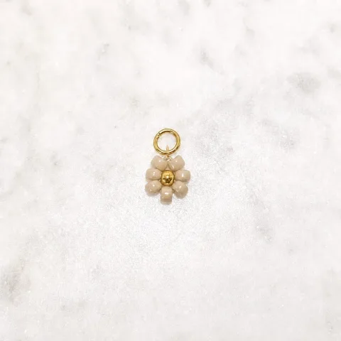 Beige bloem bedel