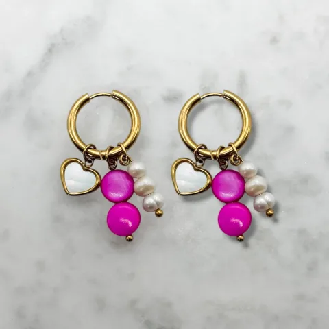 Roze oorbellen met bedels